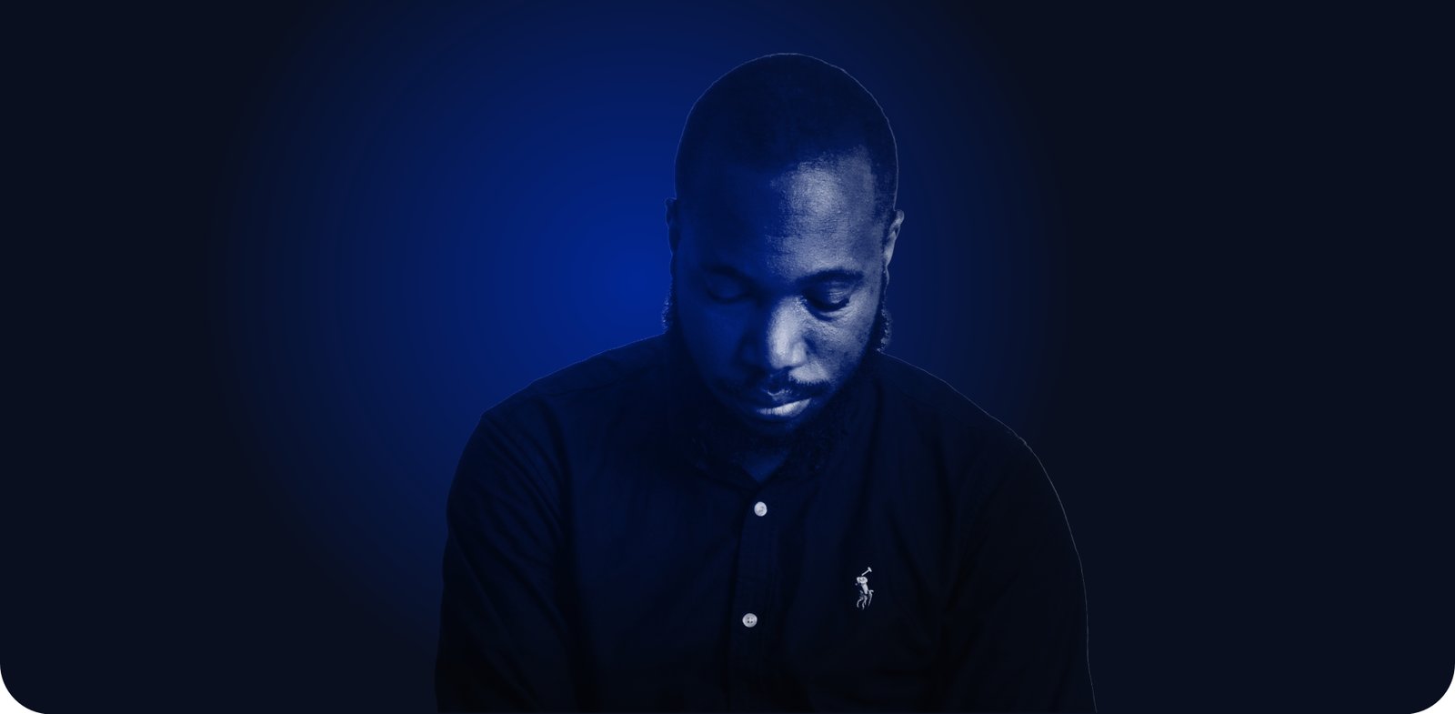 Portrait of Ernest Adzesu in blue light
