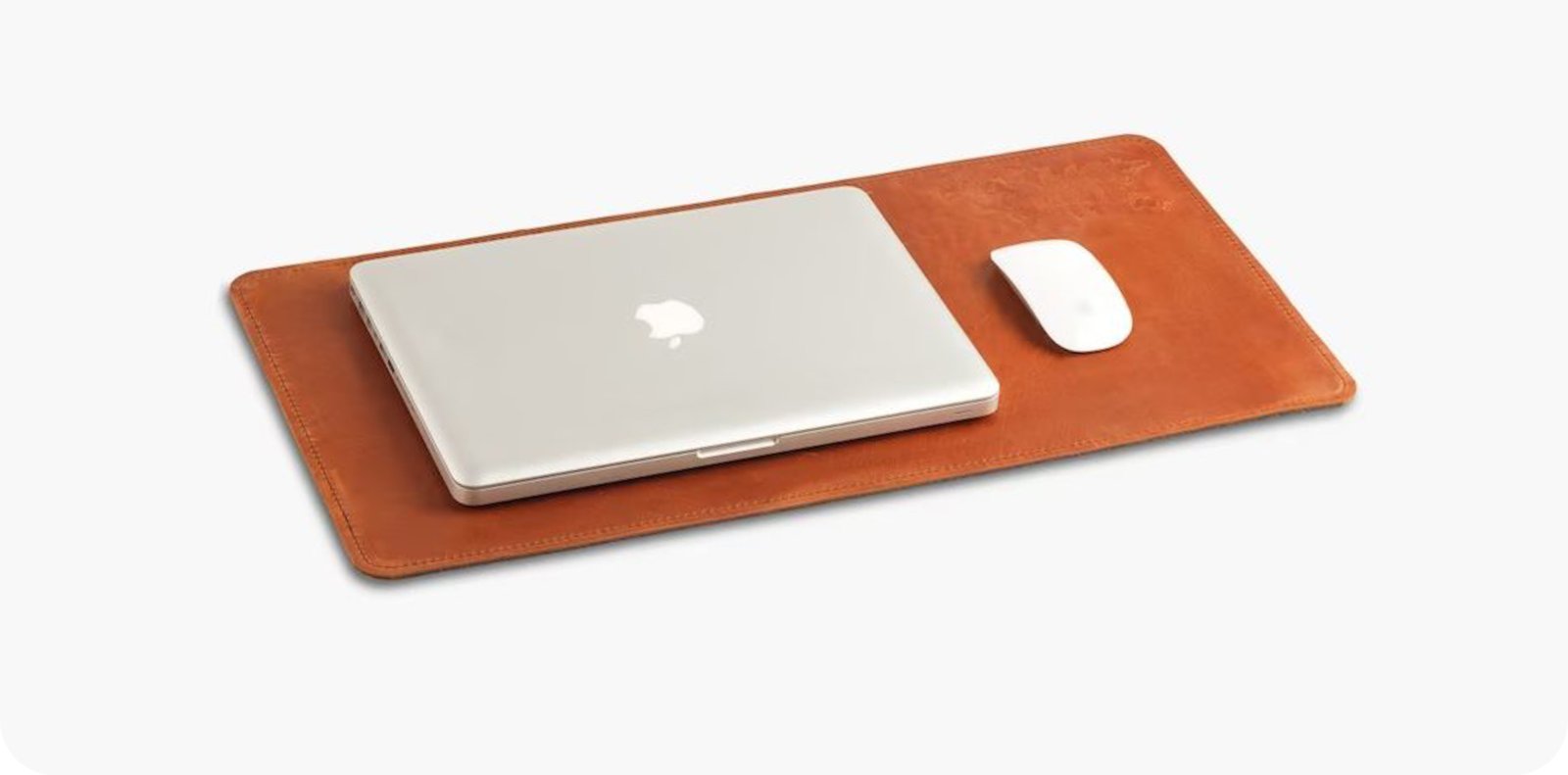 Leather desk mat with laptop and mouse